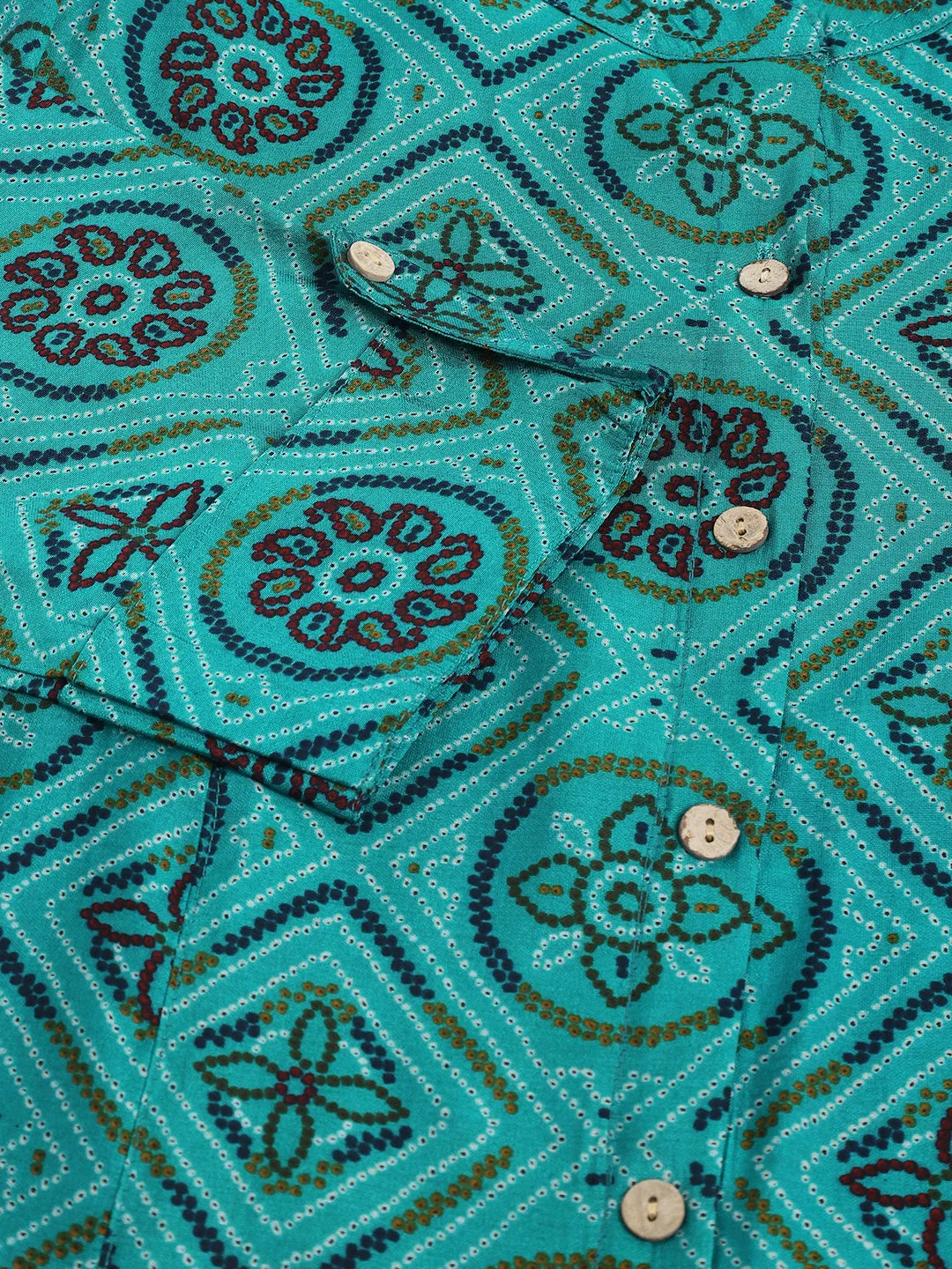 Jashvi Turquoise Blue Printed Muslin Fold Sleeve top
