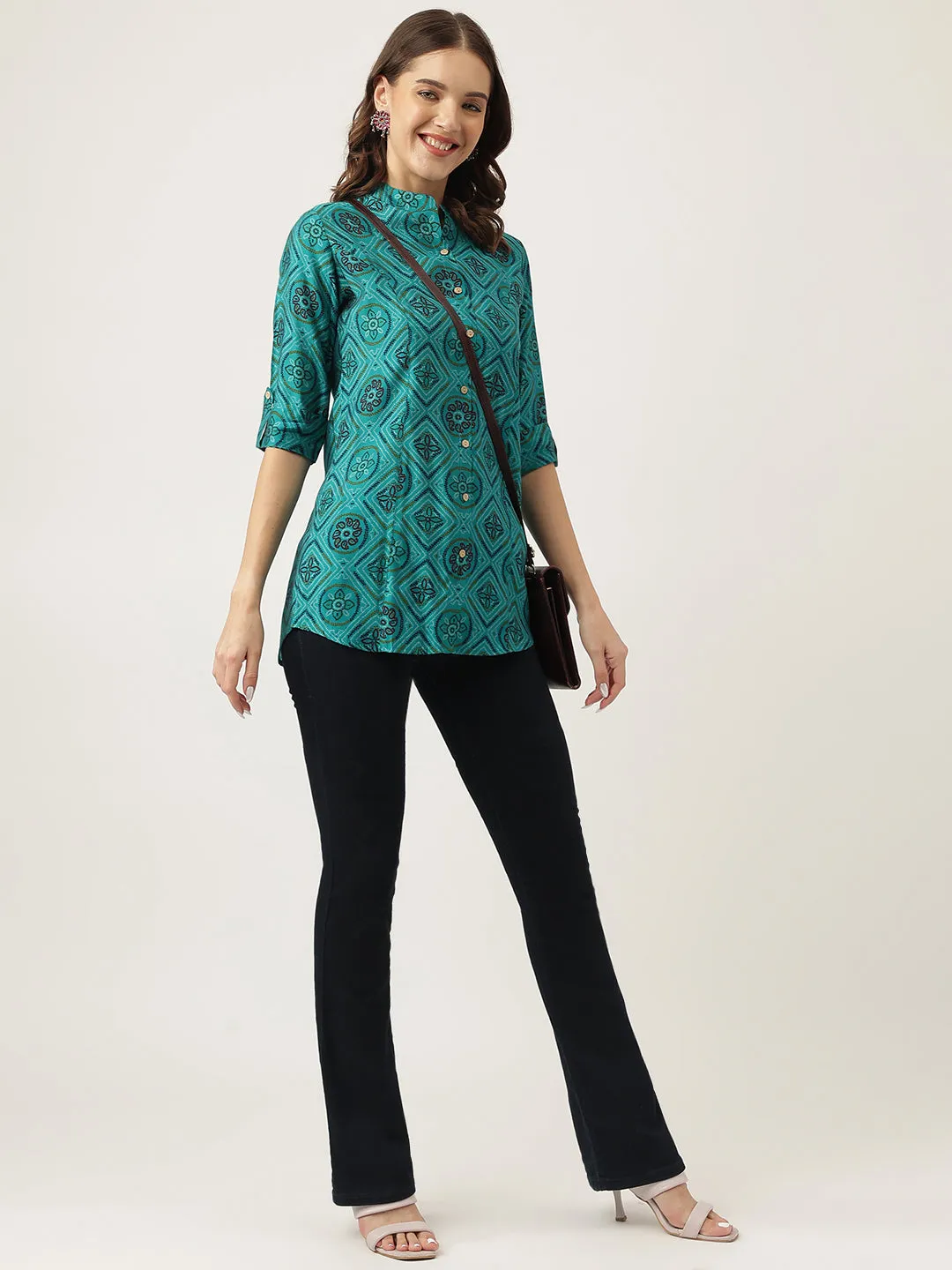 Jashvi Turquoise Blue Printed Muslin Fold Sleeve top
