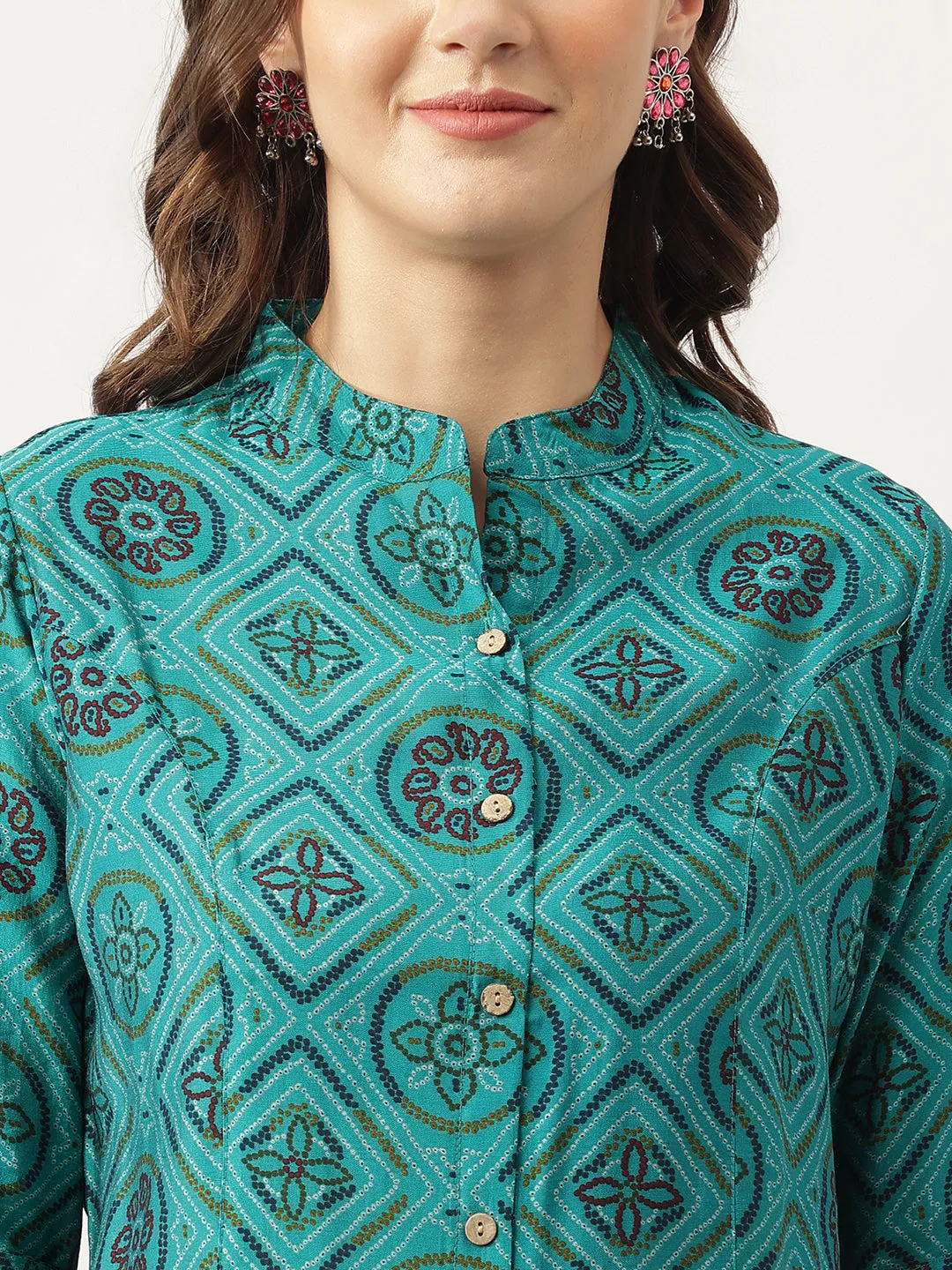 Jashvi Turquoise Blue Printed Muslin Fold Sleeve top