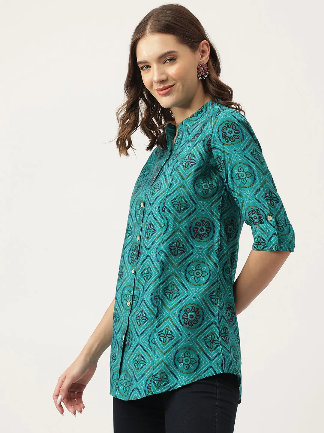 Jashvi Turquoise Blue Printed Muslin Fold Sleeve top