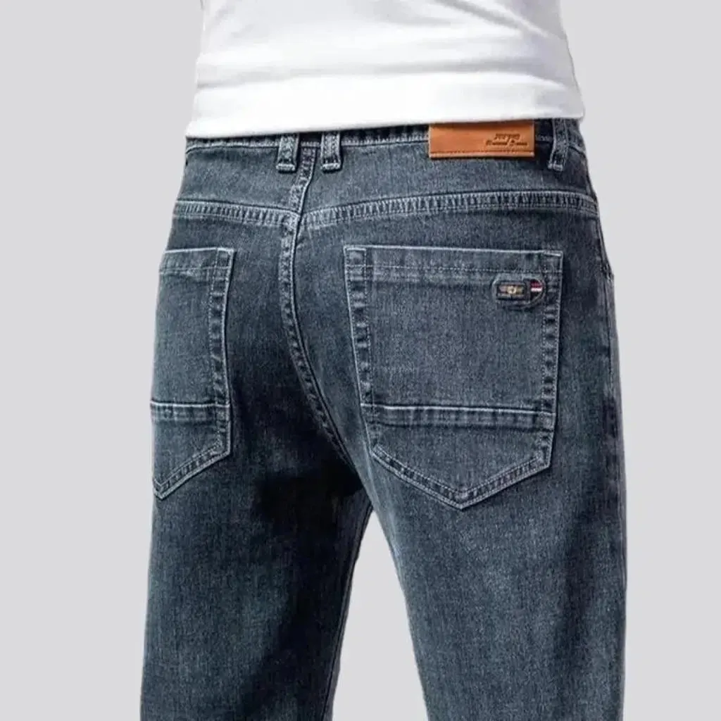 Stretchy men's tapered jeans