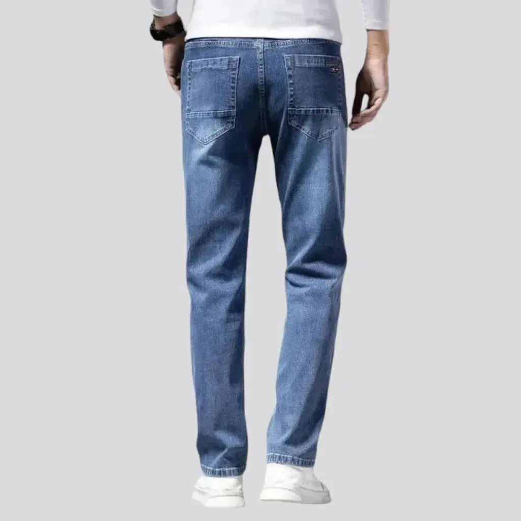 Stretchy men's tapered jeans