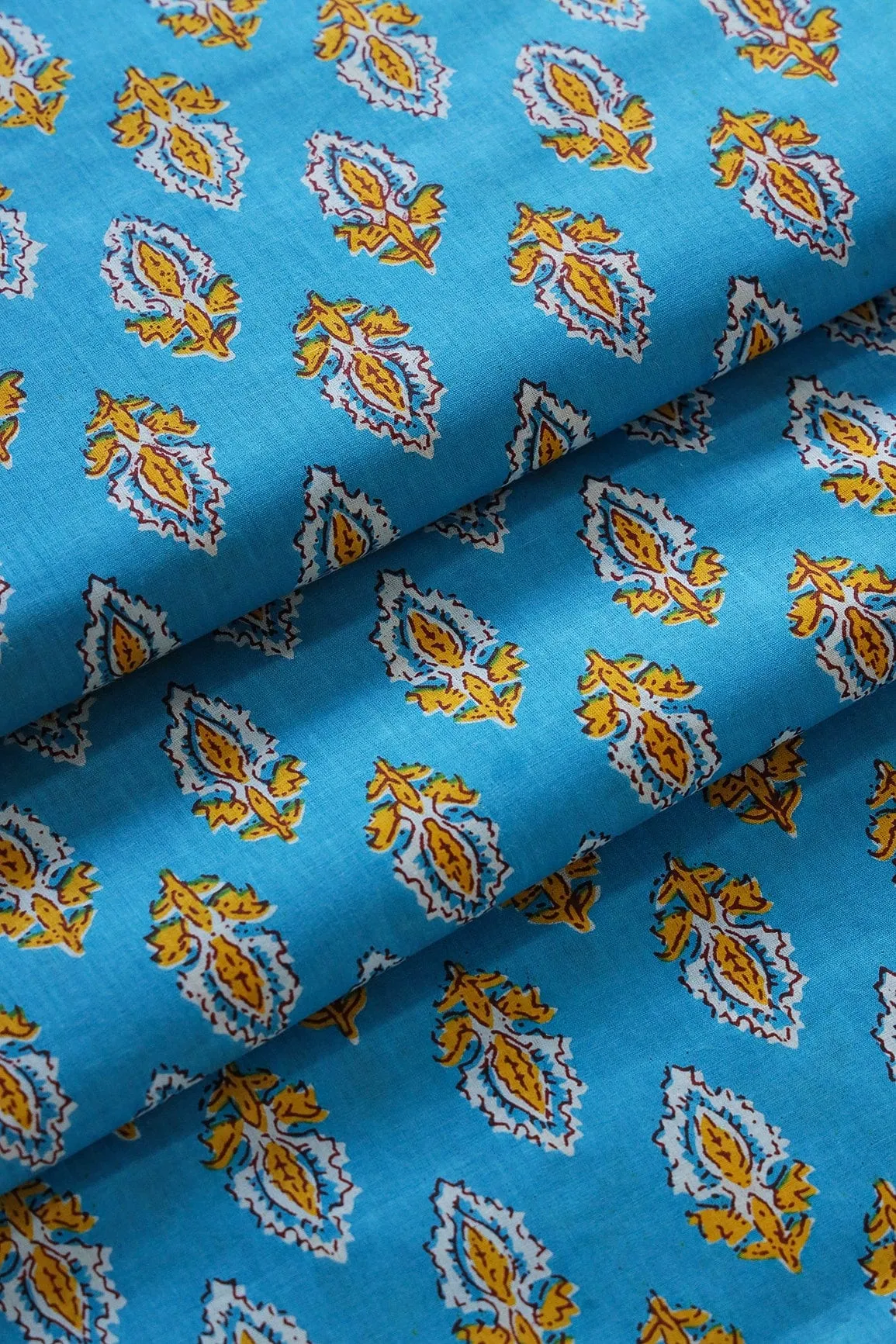 Yellow And White Small Floral Booti Pattern Print On Blue Pure Cotton Fabric